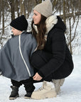 Gustine Housse et Poncho 3 en 1 pour le siège d'auto et porte-bébé En sortie Gustine baby carrier