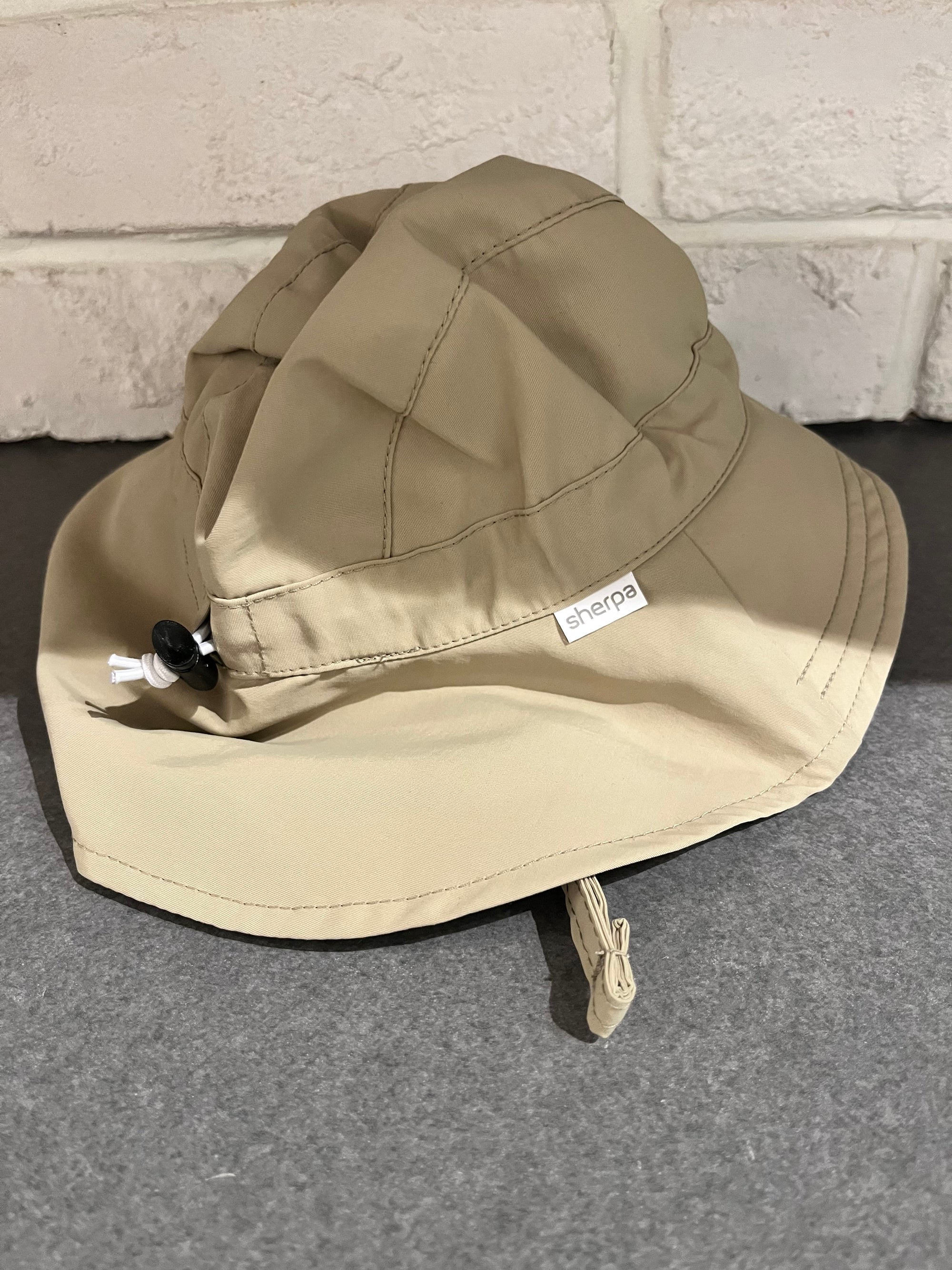 Sherpa Canada Chapeau sport en nylon 4-6 ans Vêtements Sherpa Canada Sable