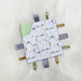 OleOops Doudou craquante à étiquettes Jouets OleOops Sur le chemin